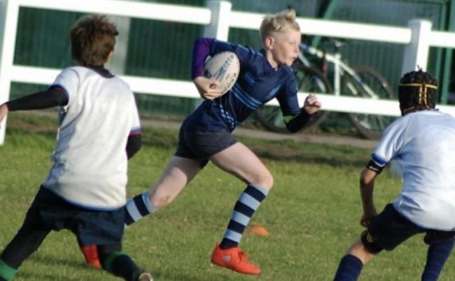 Dylan-playing-rugby