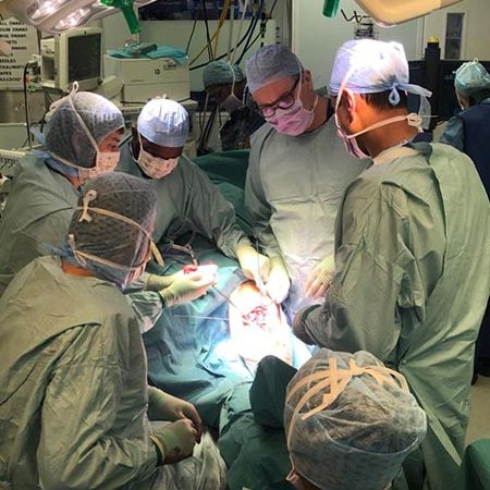 Adrian, Raghbir and Ronald in surgery