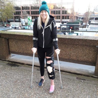 Olivia pro-athlete on crutches