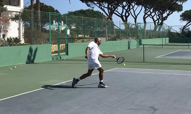 Ken playing tennis