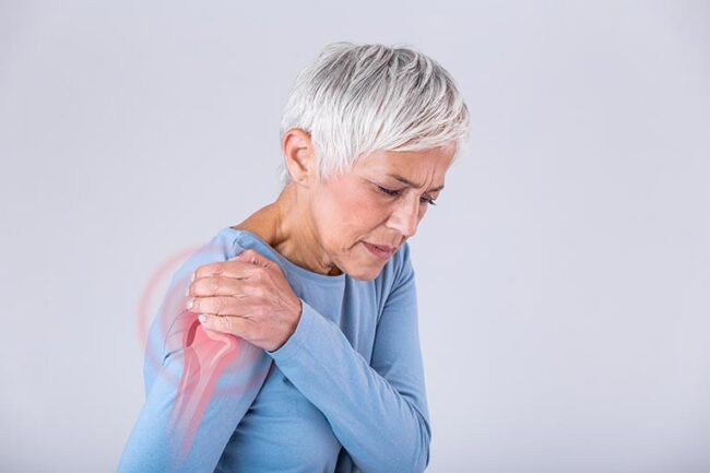 Senior woman shoulder pain